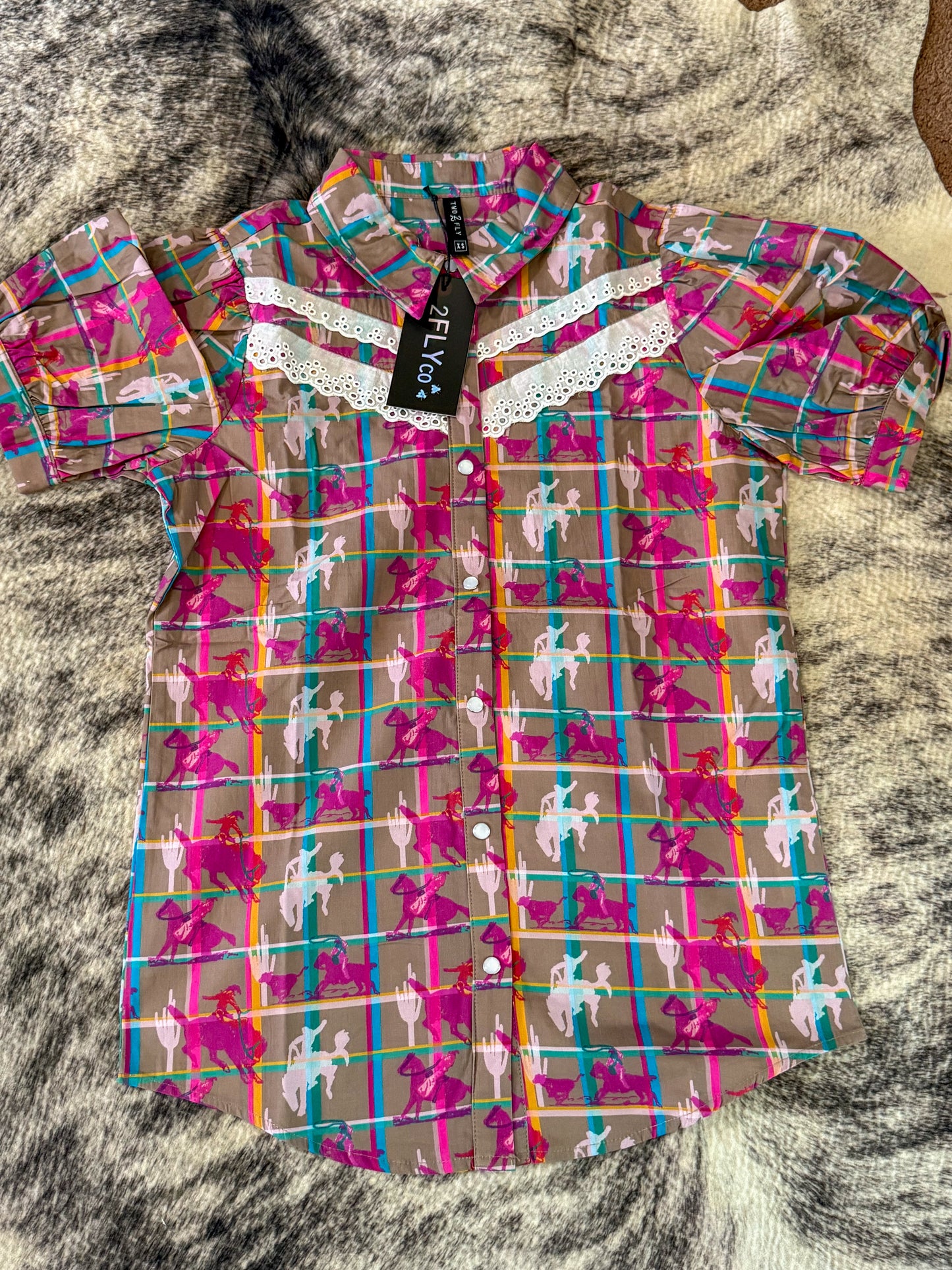 The plaid posse button up