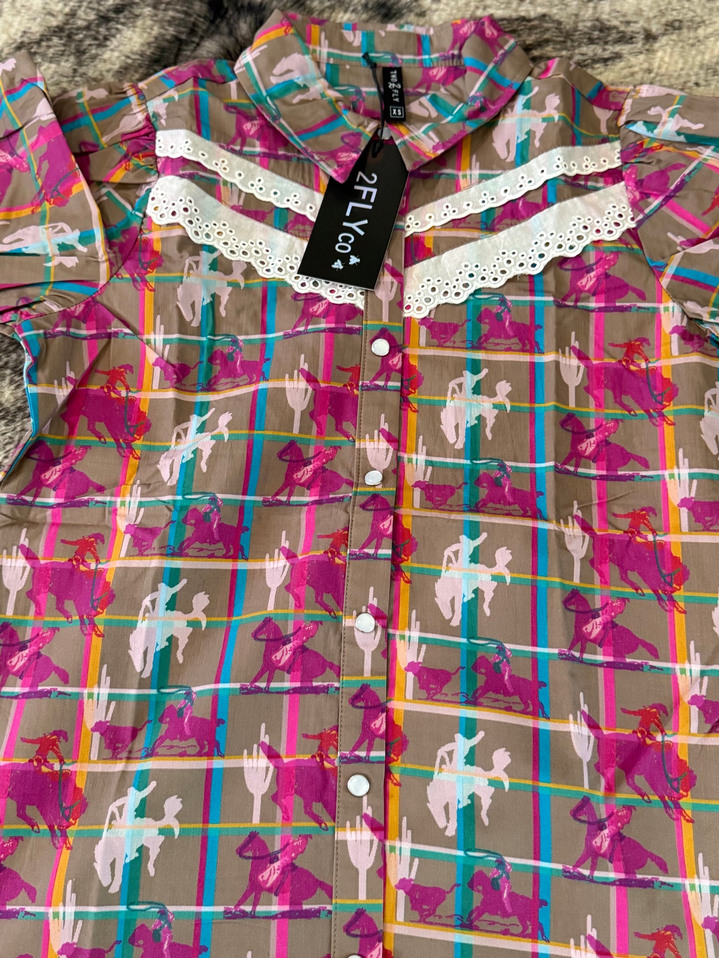 The plaid posse button up