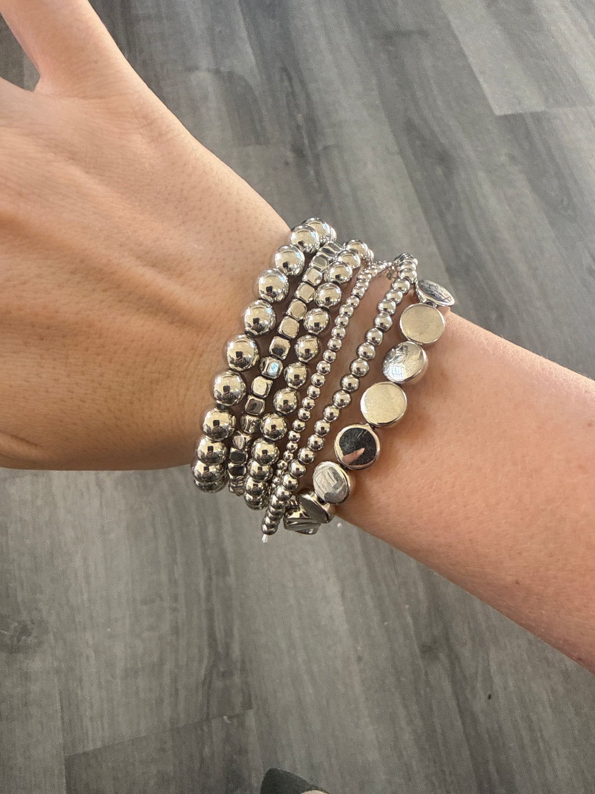 The silver cowgirl stretch bracelets