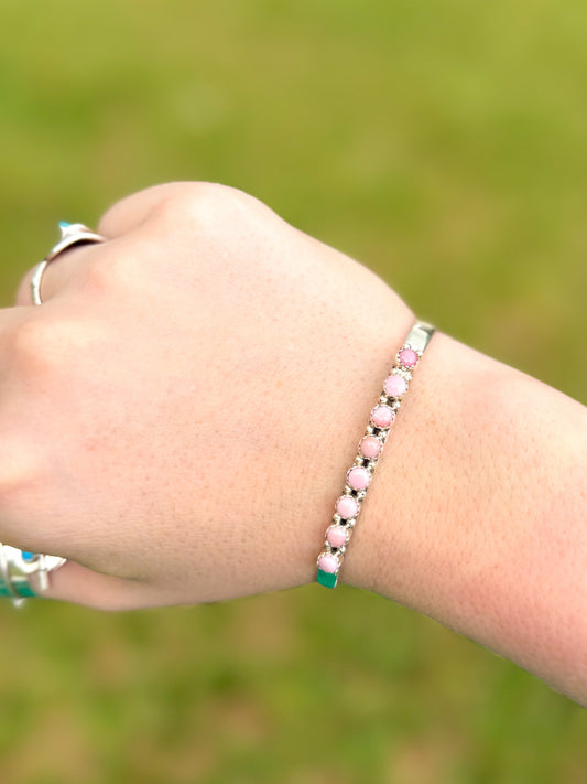 Pink conch stacker cuff