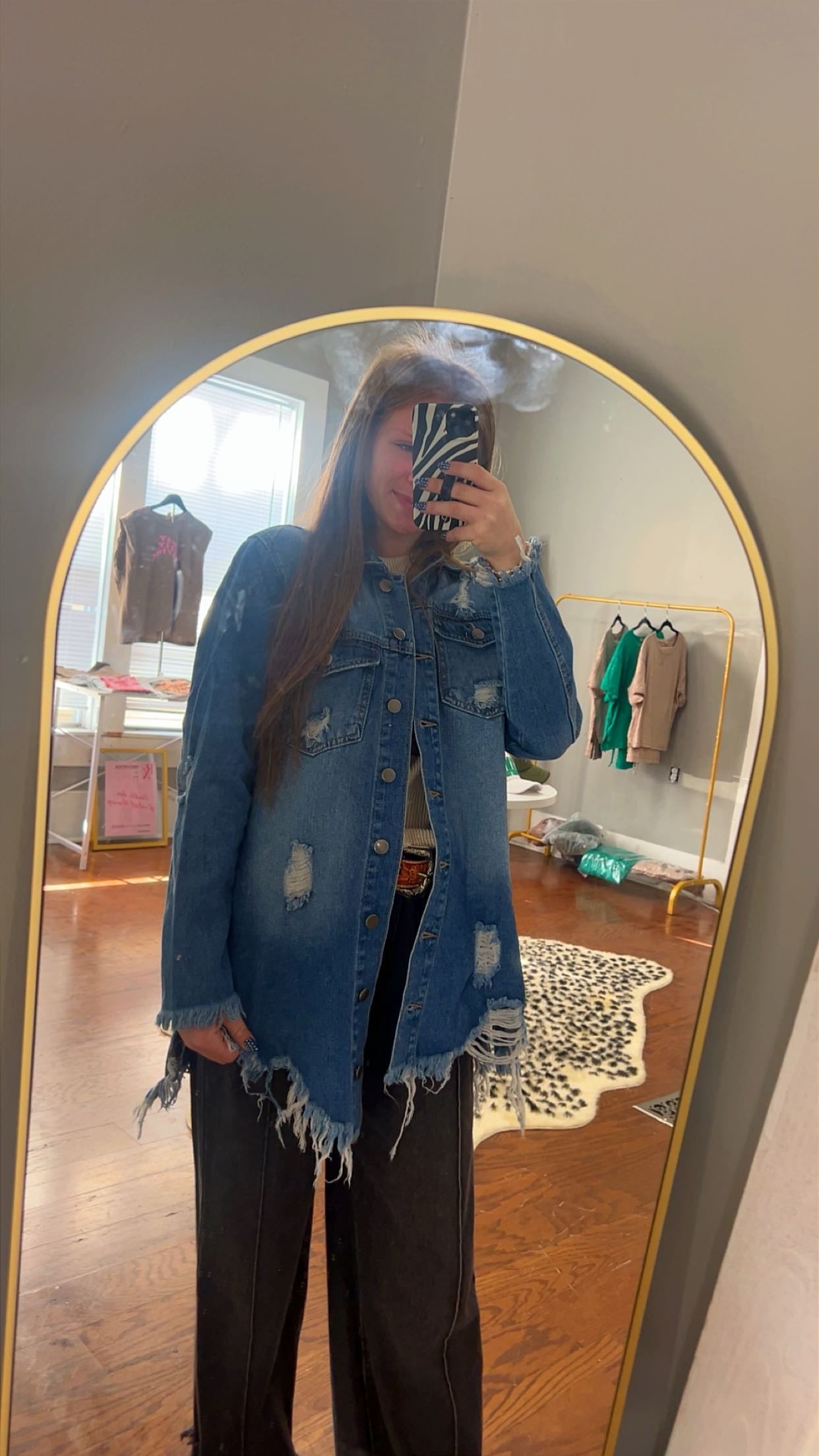 Distressed denim jacket