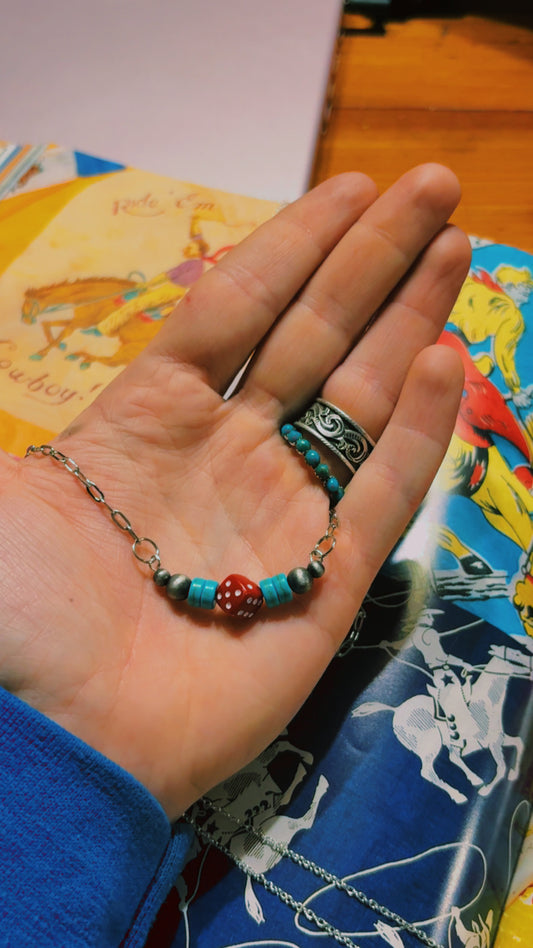 The red gambler bar necklace