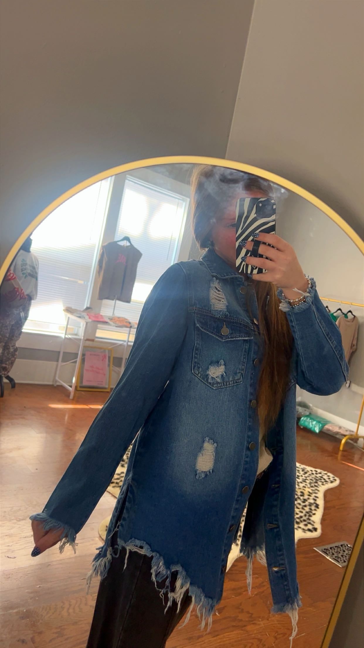 Distressed denim jacket