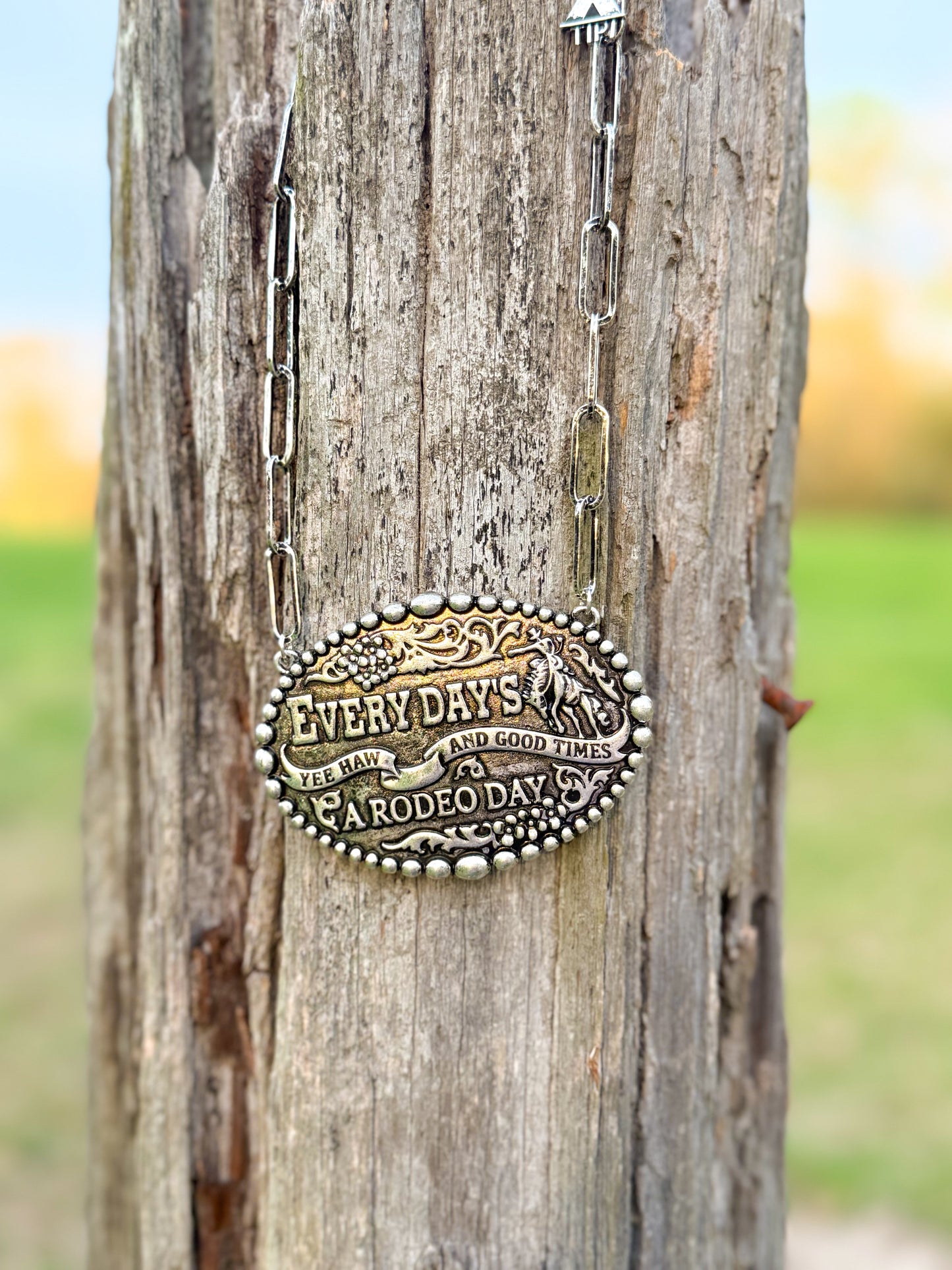 Large chunky belt buckle necklace - Bronc rider