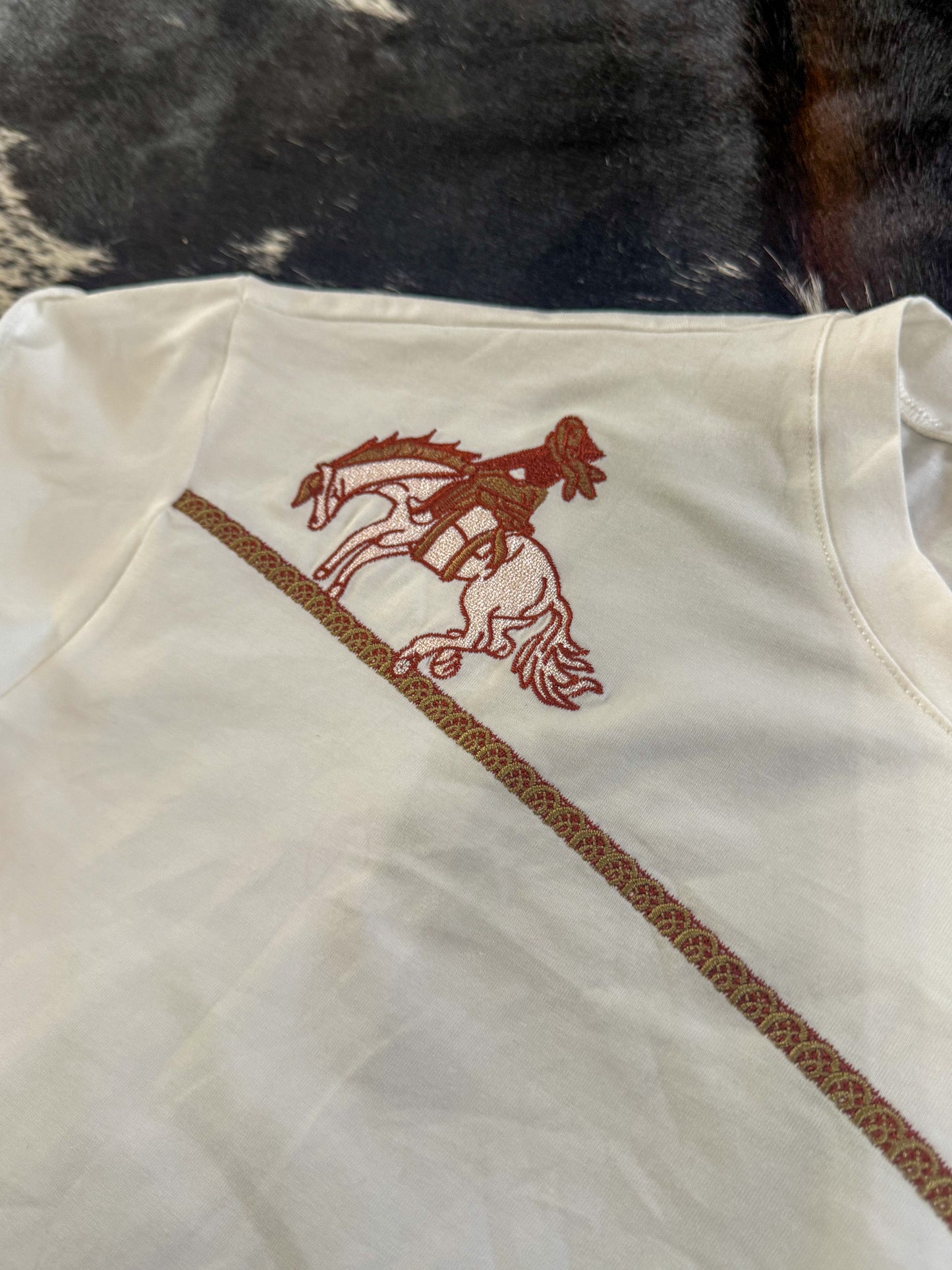 The bucking bronco top