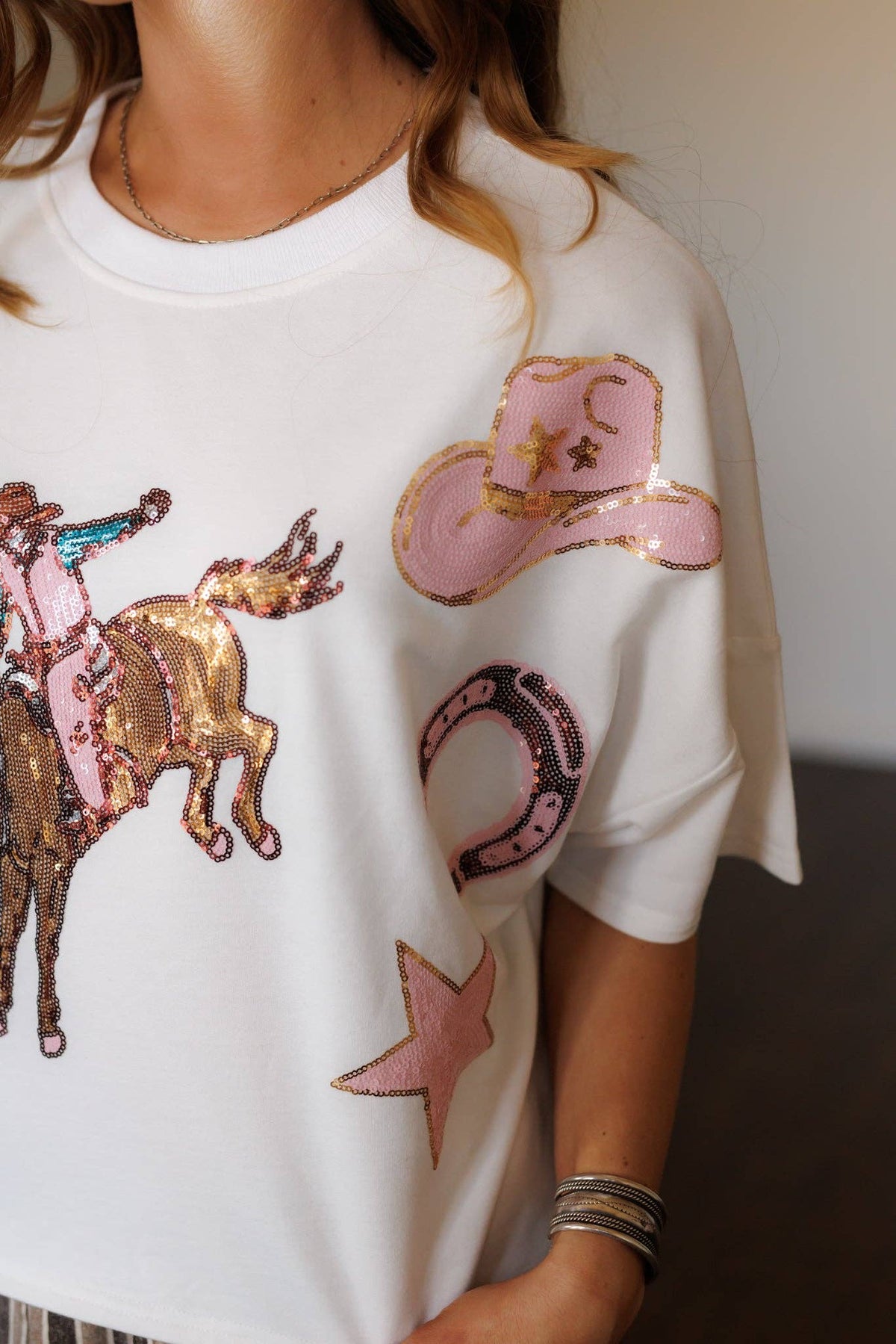 Dolman Bucking Horse Sequin top