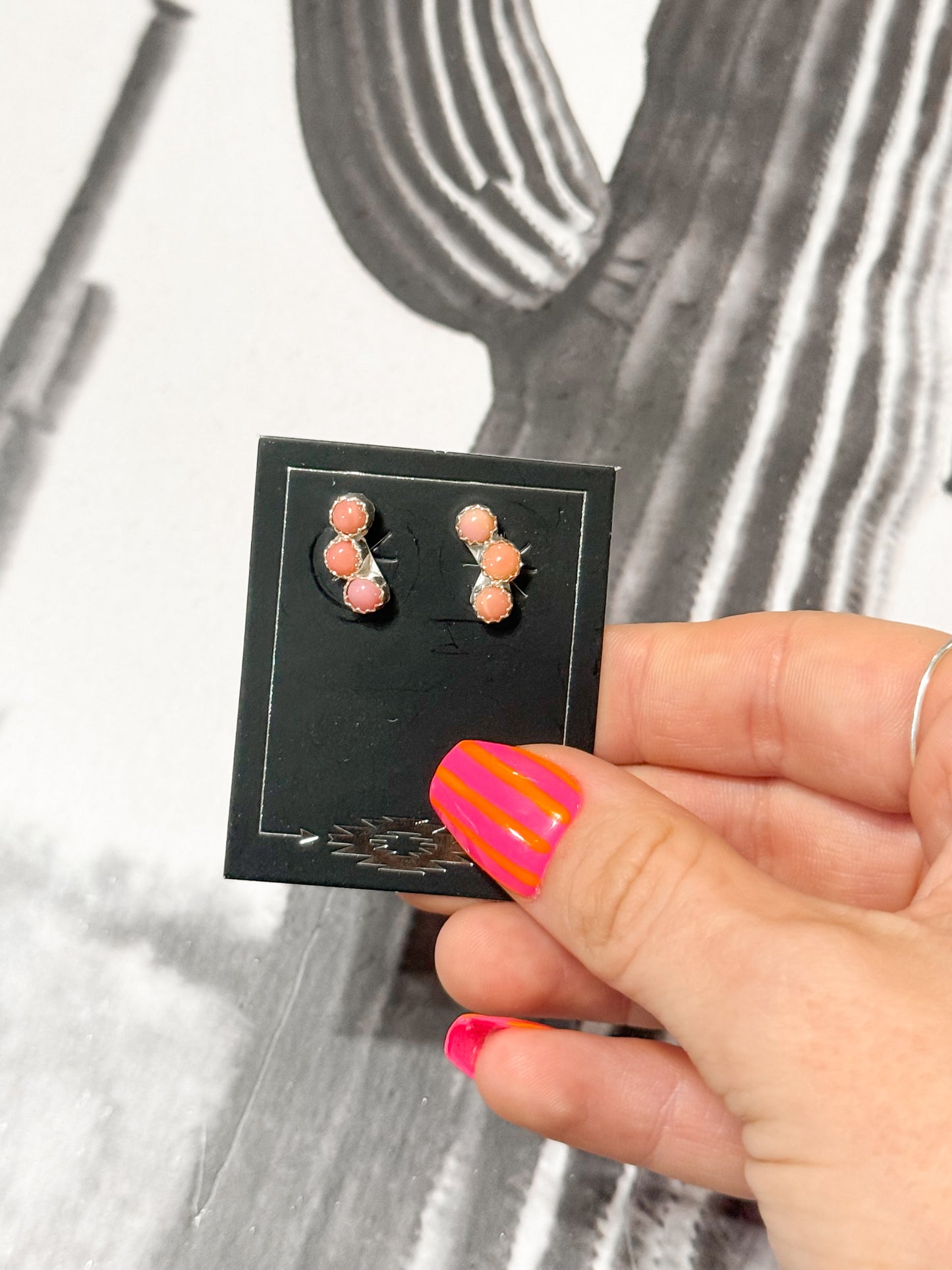 Pink conch crawler earrings