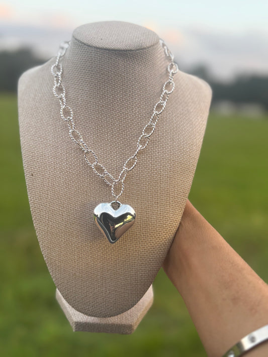 The silver heart necklace