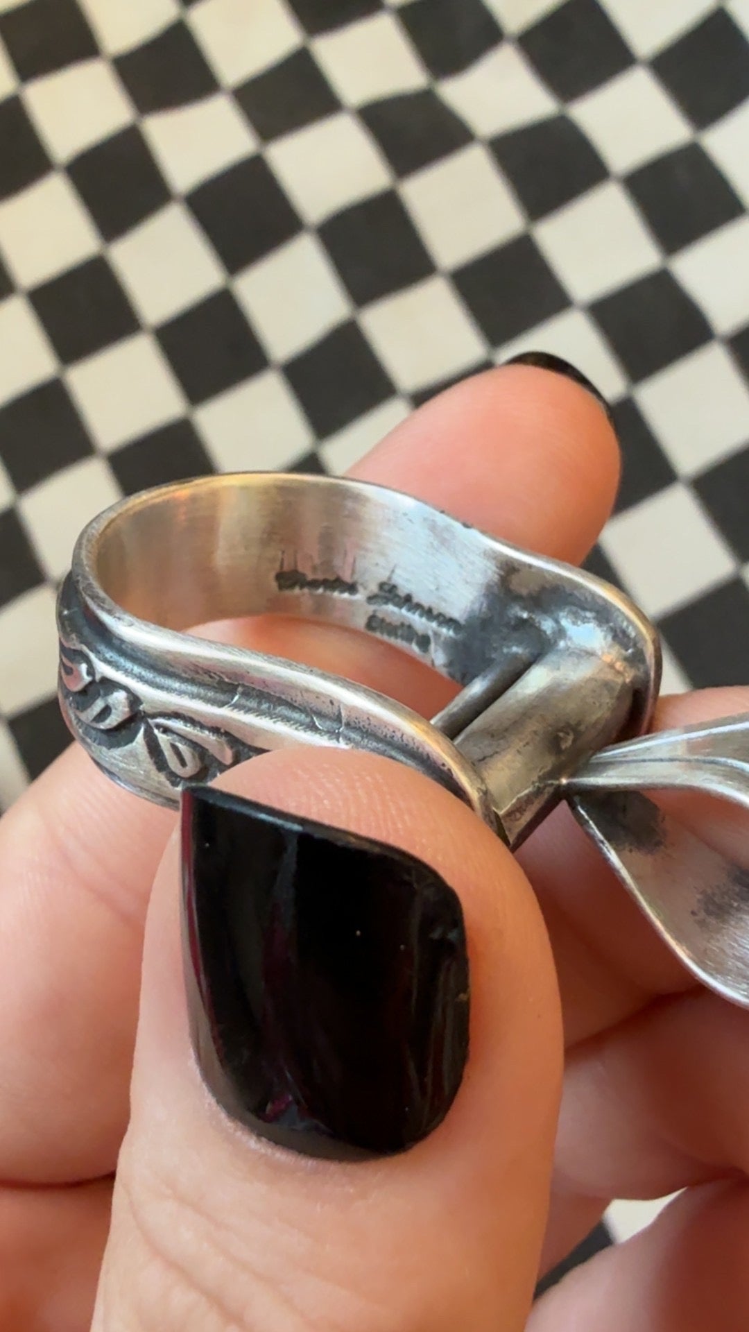 The cowgirl stirrup pendant