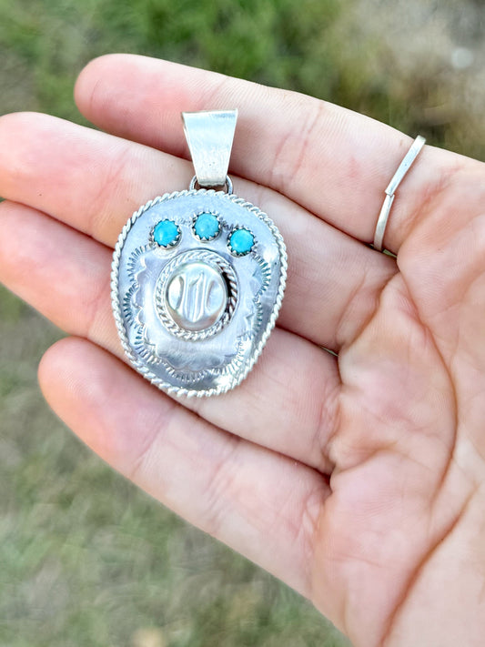 The cowboy hat pendant