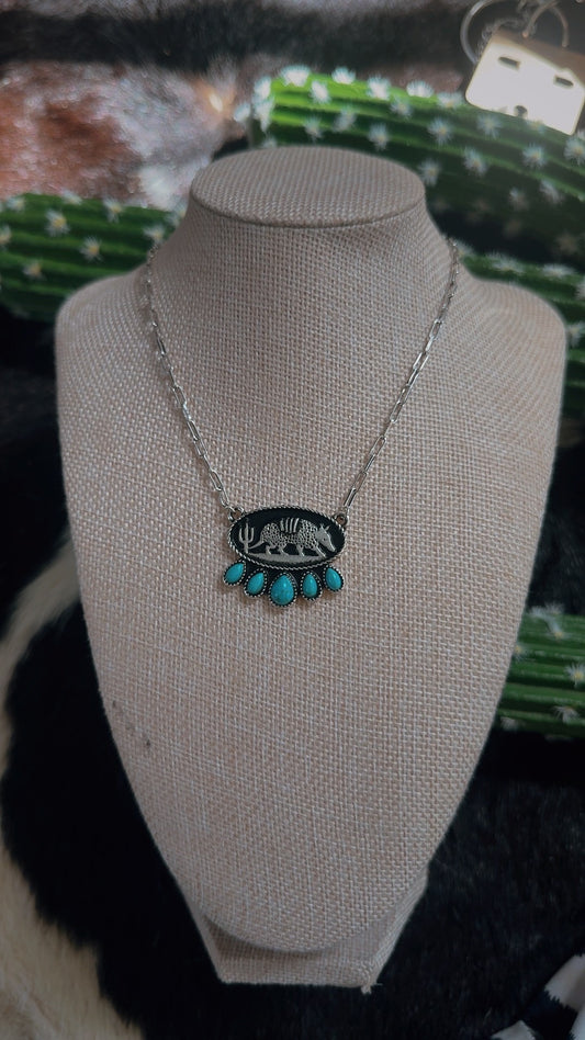 The roaming dillo necklace