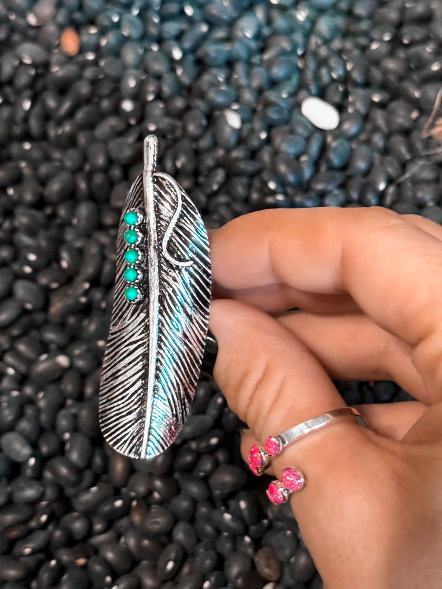 Feather adjustable ring