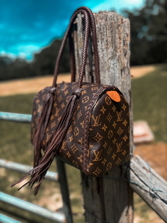 The designer speedy inspired bag