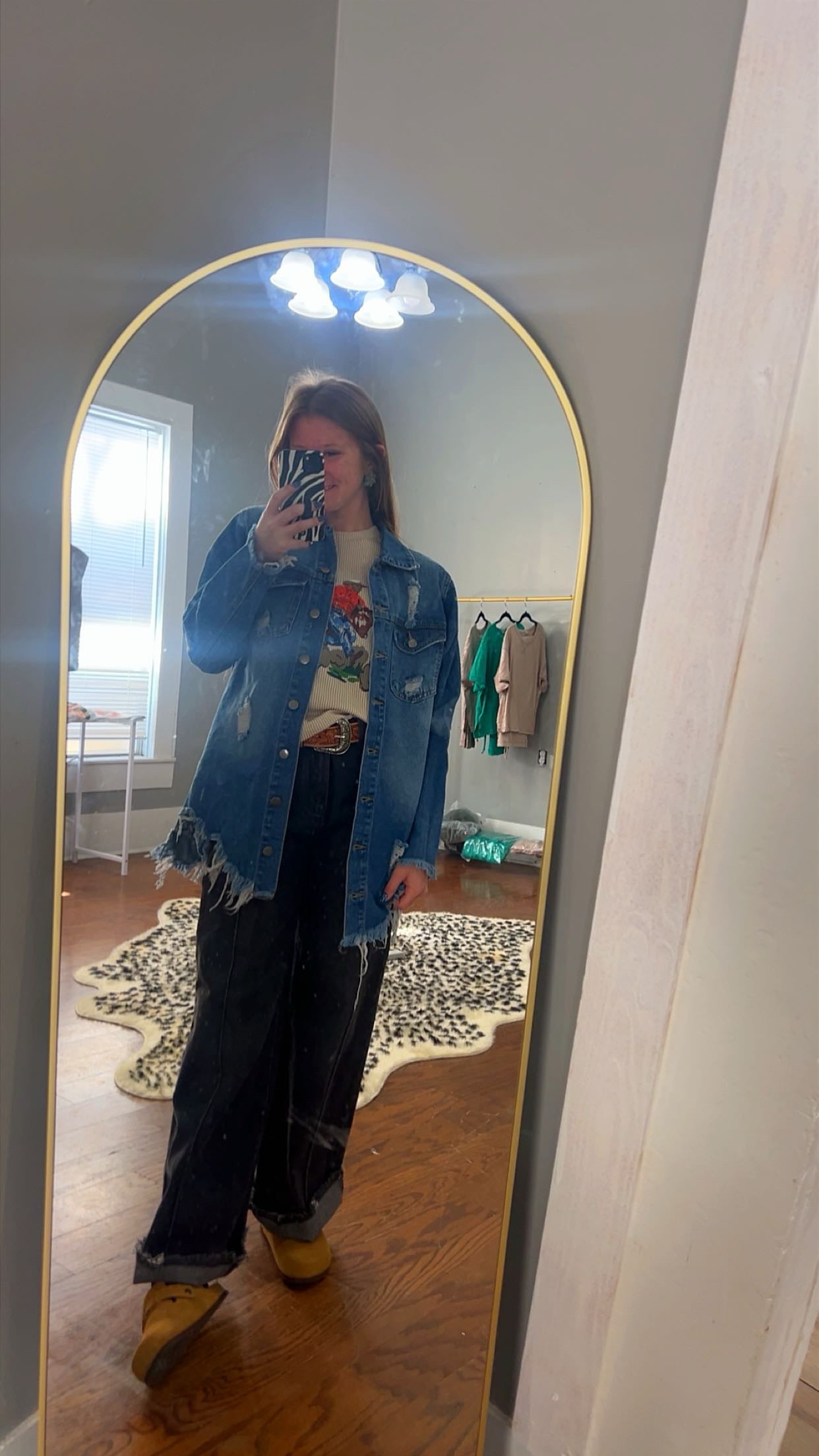 Distressed denim jacket