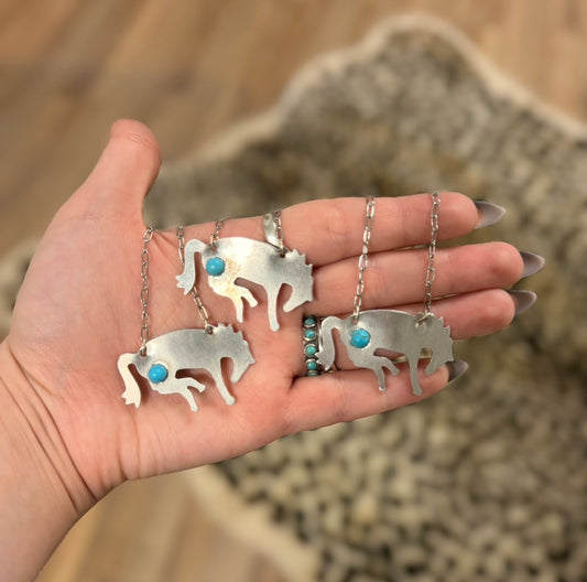 The OG bucking horse necklaces