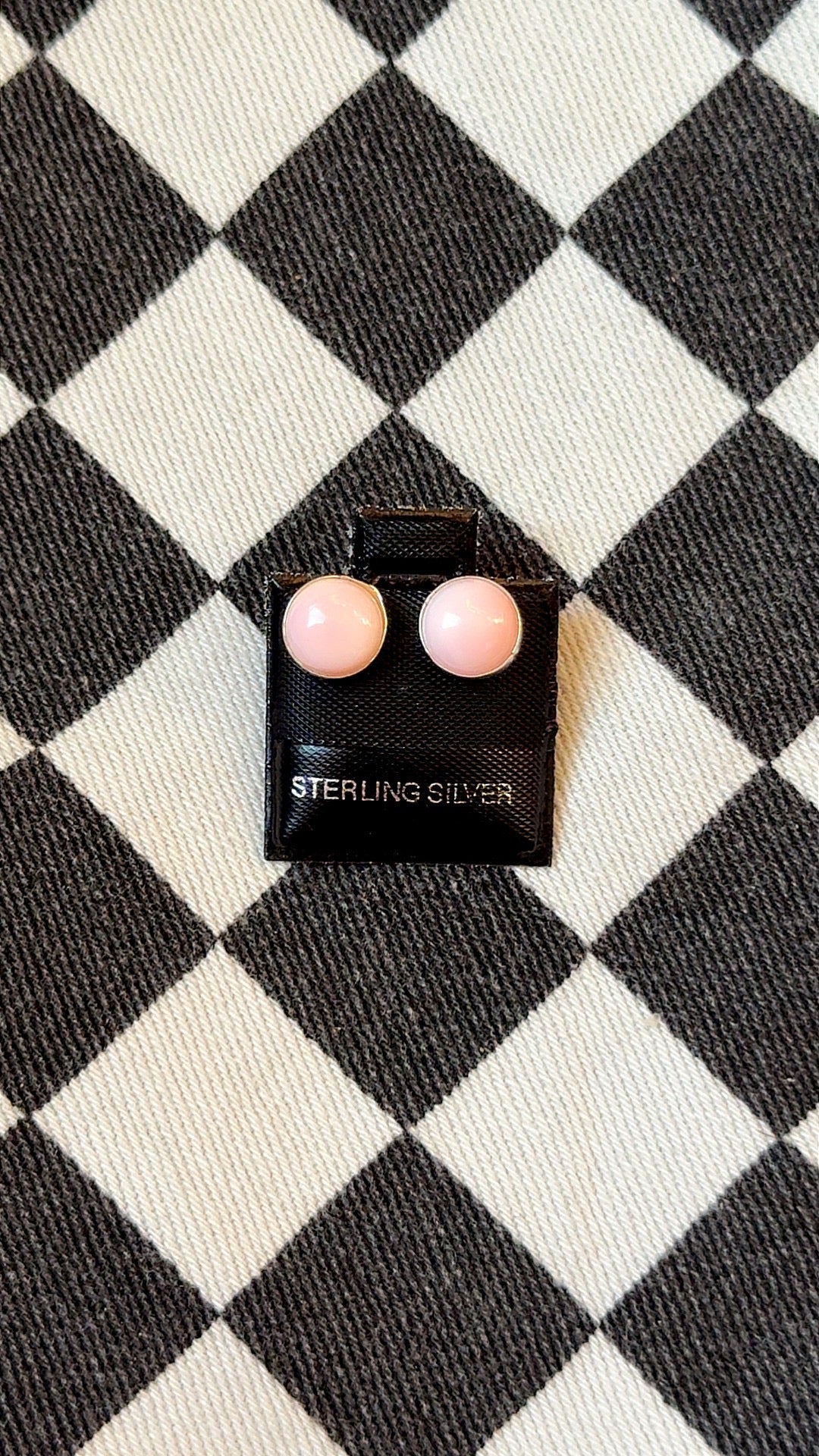 Pink conch studs