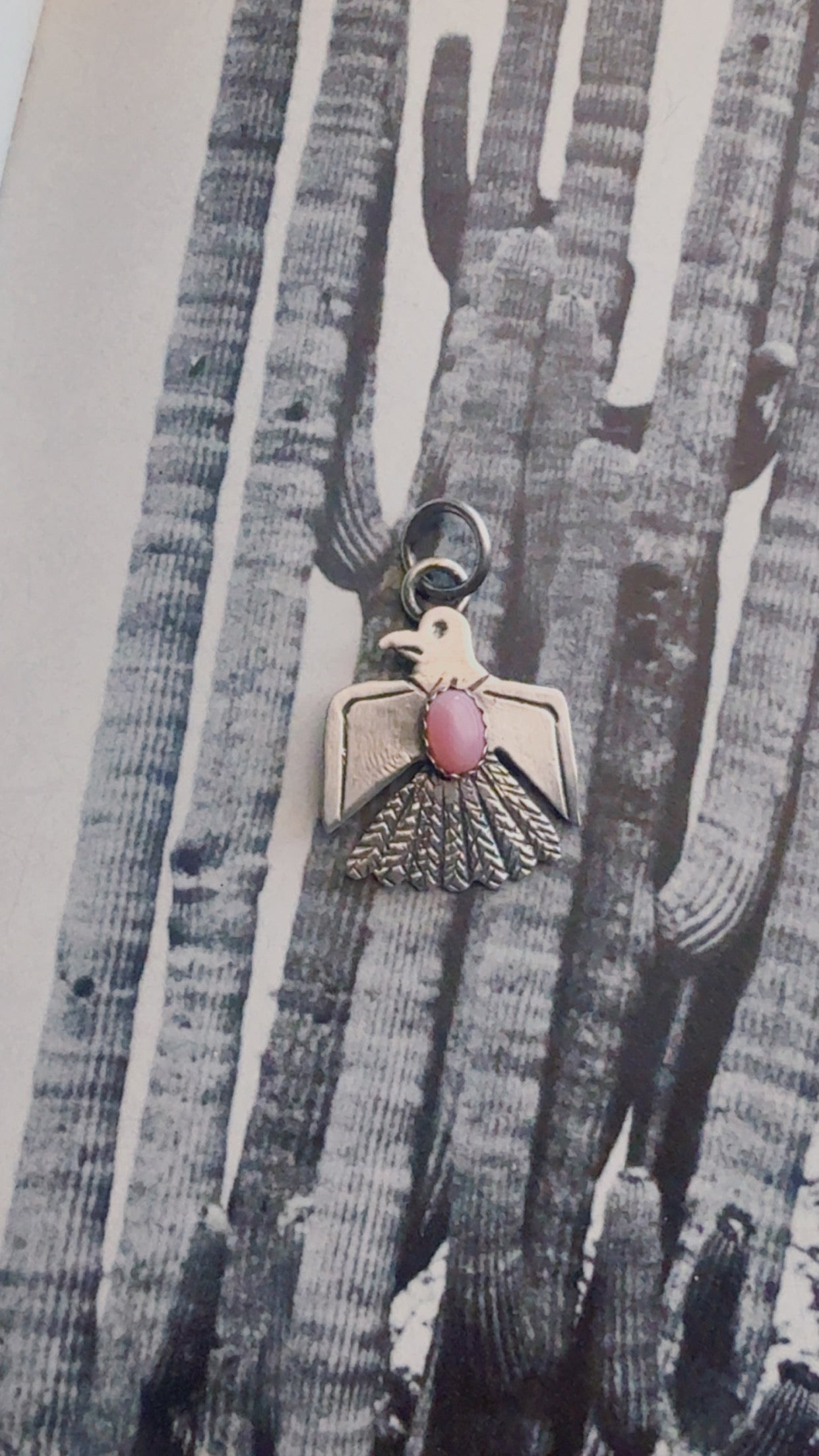 Pink conch Thunderbird pendant