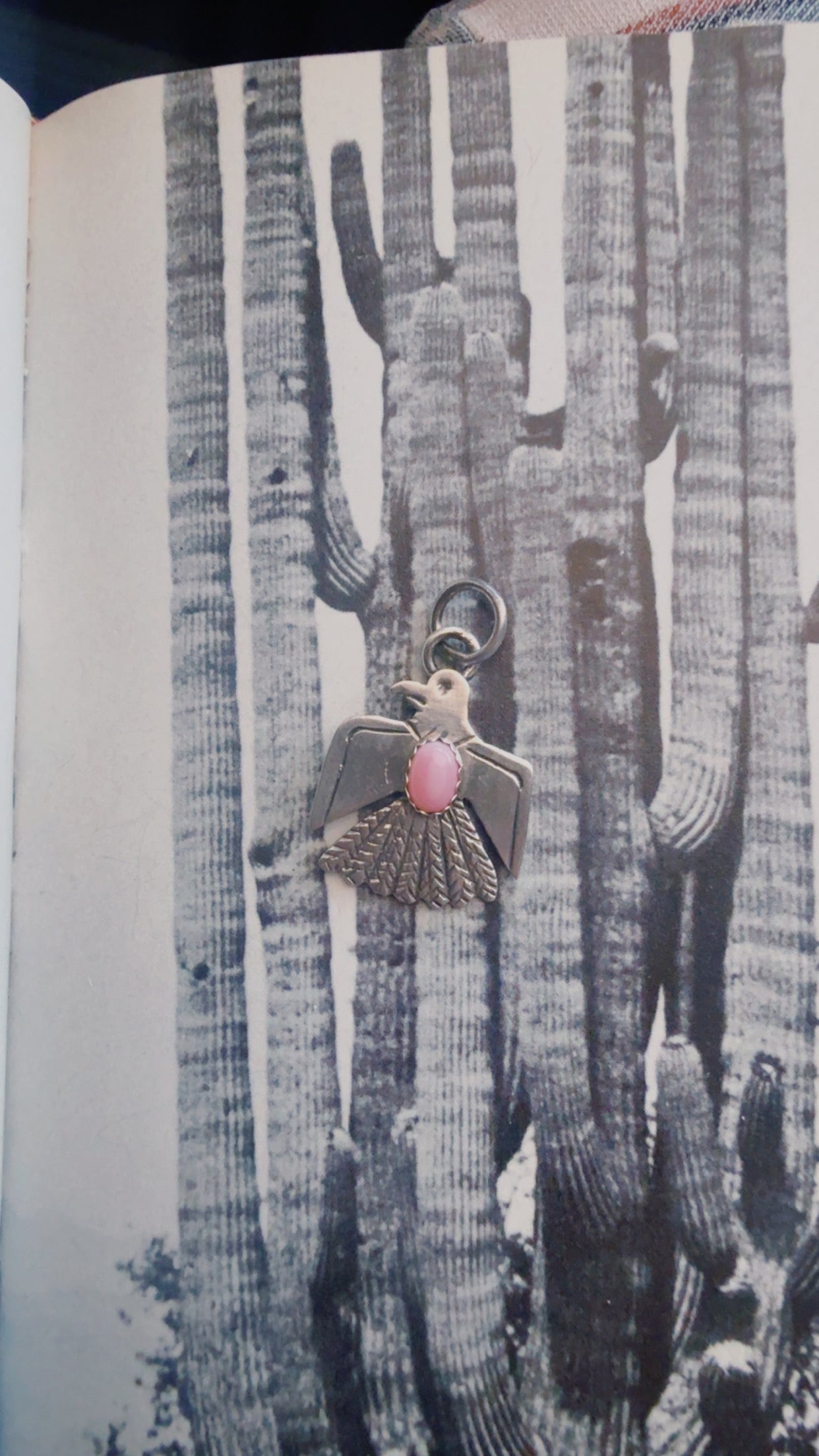 Pink conch Thunderbird pendant