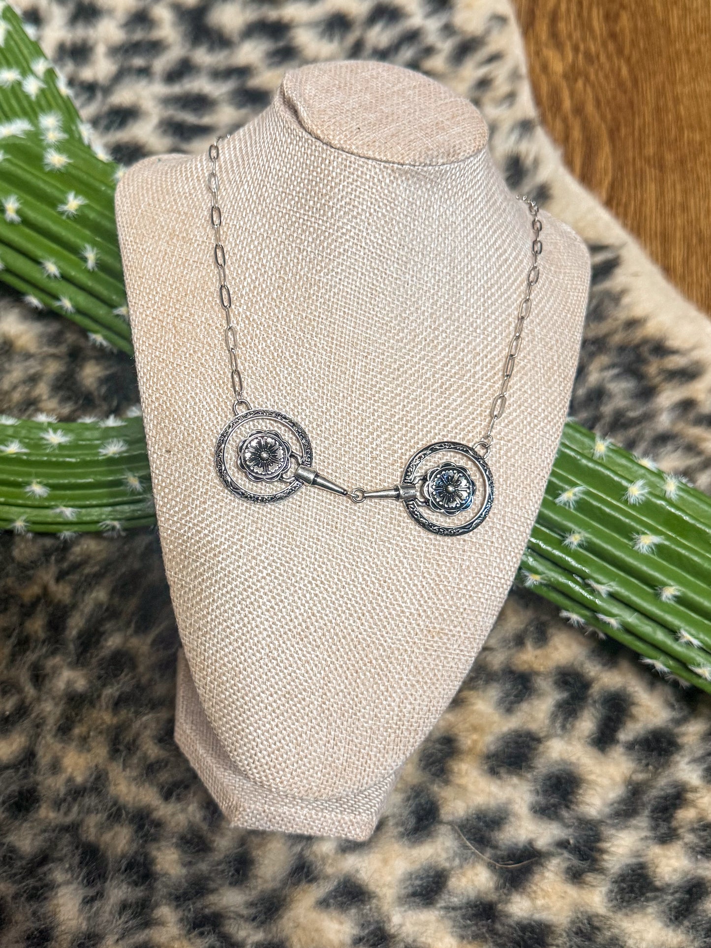 The engraved snaffle necklace