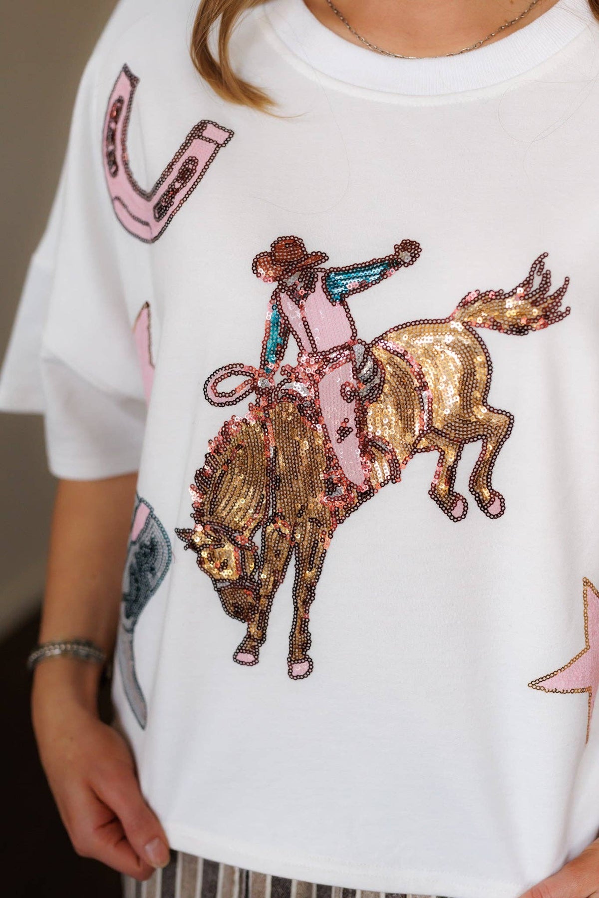 Dolman Bucking Horse Sequin top